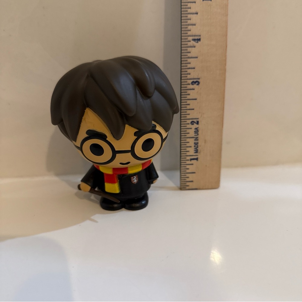 Wizard Character Toy Figure - Black, Yellow, and Red